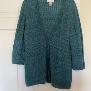 100% acrylic turquoise one button sweater.